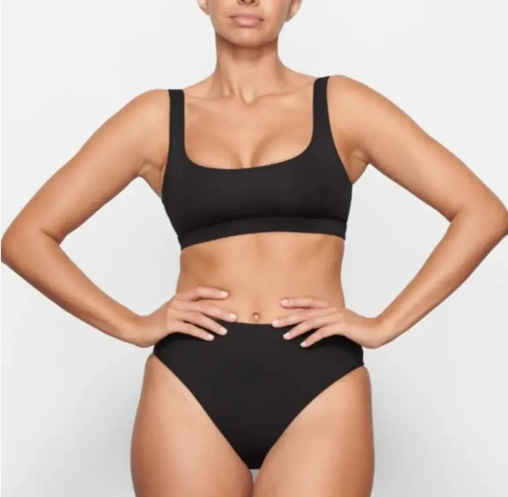 Skims black tank bikini top